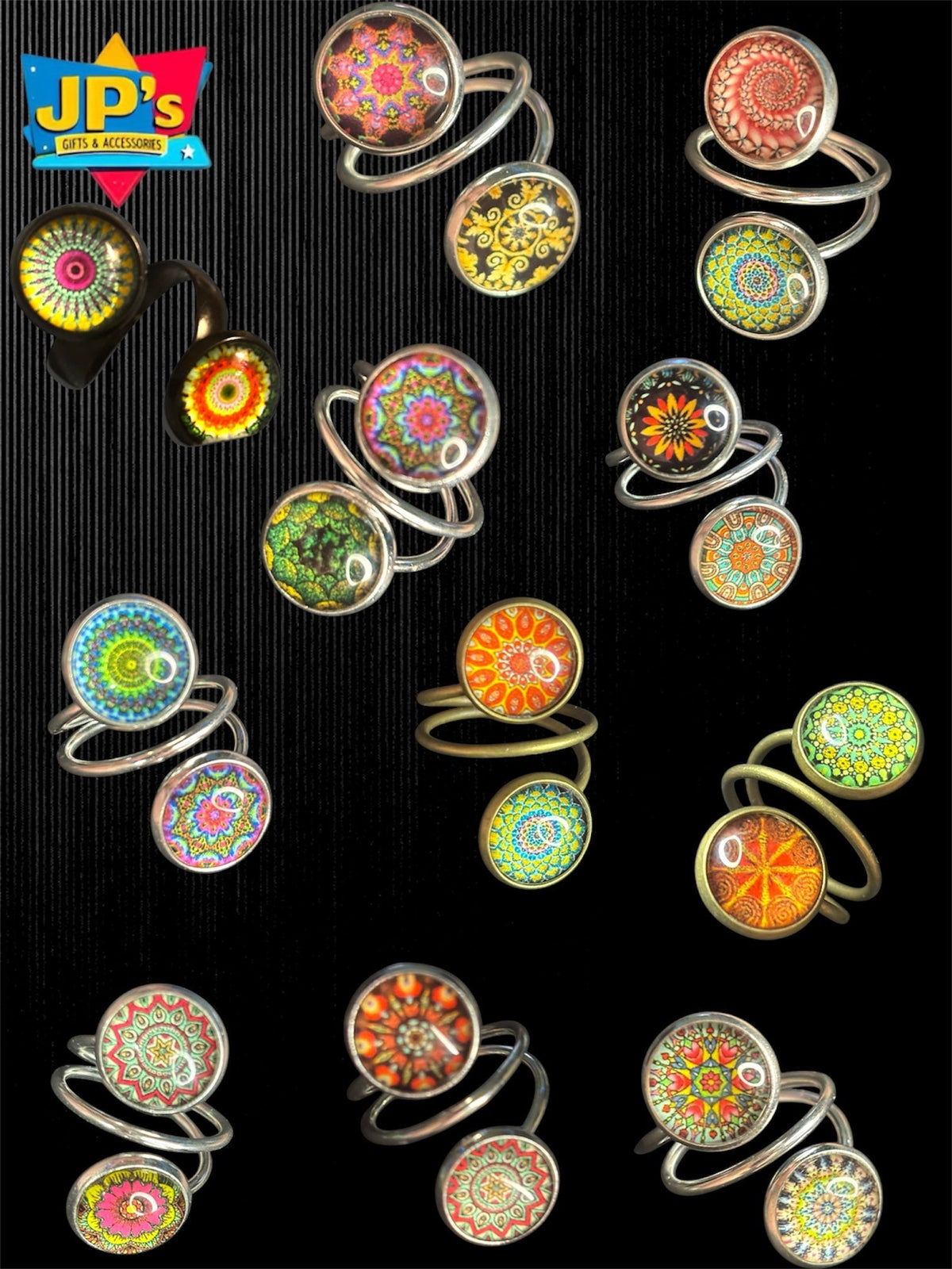 Collection of boho-inspired double rings with colorful mandala and geometric patterns in metal frames.