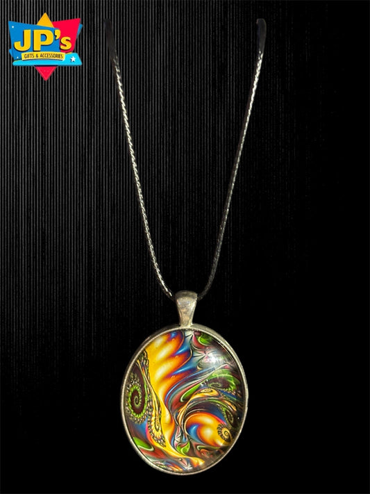 Large oval glass pendant with vibrant multi-color abstract pattern on silver chain necklace.