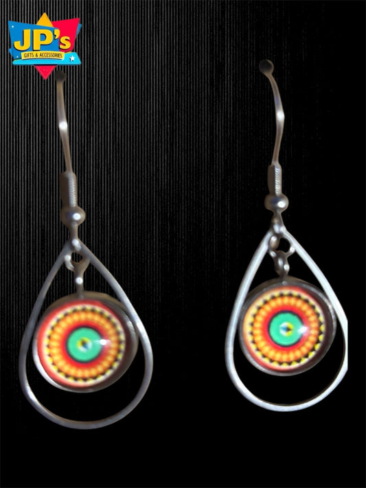 Pair of handmade bohemian tear drop earrings with turquoise, red, and gold circular resin domes and metal findings.