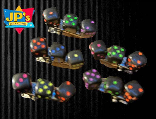 Five black plastic hair clips with glowing dice designs in assorted colors including red, green, blue, pink, and orange LED lights.